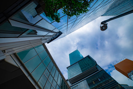 A cloud reflecting a building in the business town wide shot