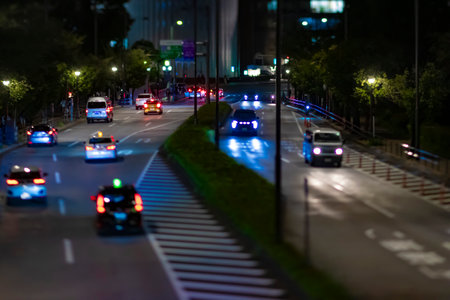 A night miniature traffic jam at the urban city street in Tokyoの写真素材