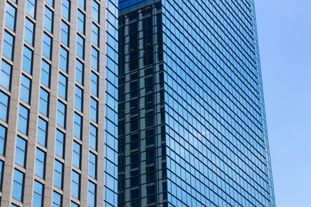 A cityscape of moving cloud reflecting the office building at the business town