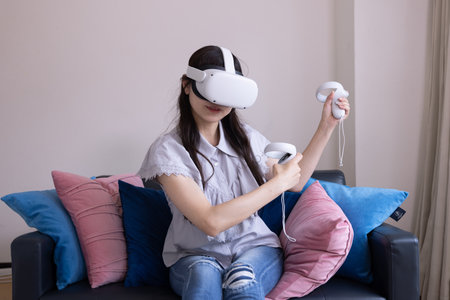 A Japanese woman playing with VR glass in the room