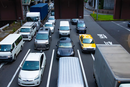 A photography of traffic jam at the city street in Tokyo telephoto shot