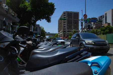 A cityscape of traffic jam near the scooter parking at Linsen N Rd in Taipeiの写真素材