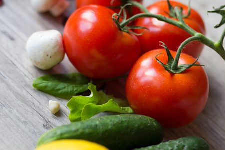 set of vegetables and mushrooms on the table for saladの写真素材