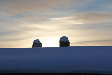 close up - sunset on a frosty winter day, drifts on the street