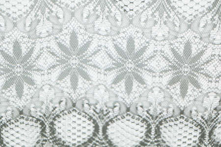 Abstract background from reflection in glass of flower and fabric on the window. Mirror reflection...