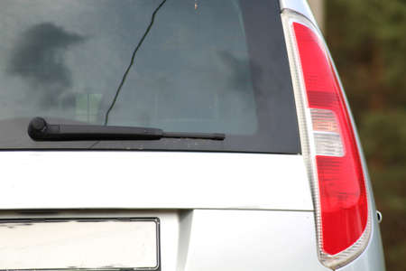 Rear of the car with brake light. The vertically positioned rear light of the car.の写真素材