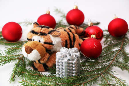 Tiger as a symbol of 2022, Christmas and New Year. Festive decorations for the new year and christmas. Christmas festive decor with a tiger on a white background.の写真素材