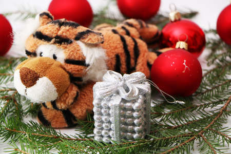 Christmas festive decor with a tiger on a white background.の写真素材