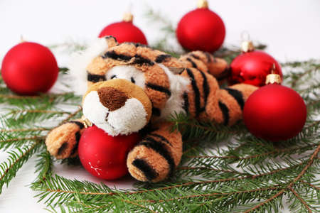 Festive decorations for the new year and christmas. Christmas festive decor with a tiger on a white background.の写真素材