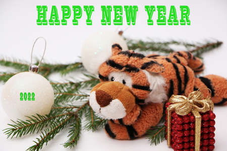 Tiger as a symbol of 2022, Christmas and New Year. Festive decorations for the new year and christmas. Christmas festive decor with a tiger on a white background.の写真素材