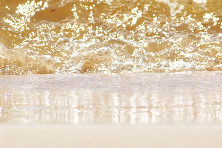 Creative background - ocean shore after a storm. Natural chaos on a sandy beach after a storm.の写真素材