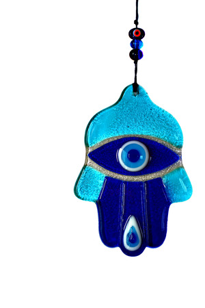 Evil eye hand of amulet on white 