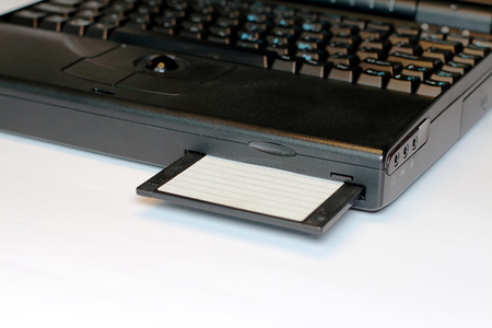 Old Laptop With Floppy Diskの写真素材