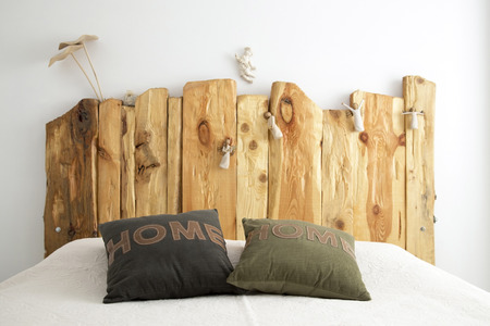 Wooden Bedroom Decoration with Sweet Pillowsの写真素材