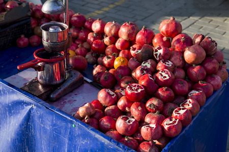 Pomegranate juice seller bench closeupの写真素材