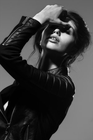Fashion photo of young lady in elegant black dressの写真素材