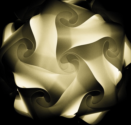 modern light ball in a black roomの写真素材