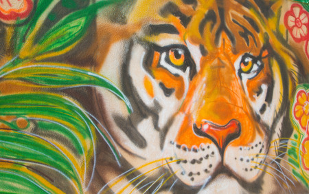 Chisinau, Moldova.May 24, 2014.Zoo. Painted wall with acrylic sprays- tiger in the jungle.Background.のeditorial素材