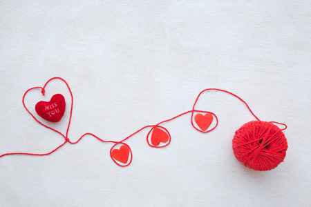 Valentines Day background on a white wooden surfaceの写真素材