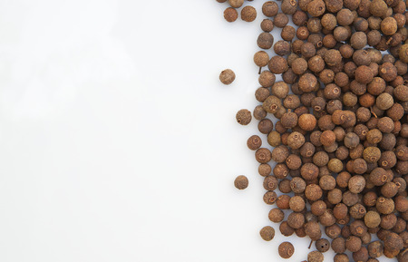 Cubeb berries on the white surfaceの写真素材