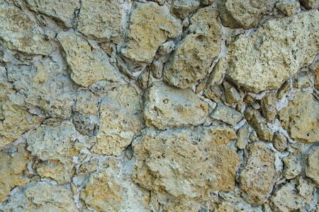 Clothed wall in stones and concrete-backgroundの写真素材