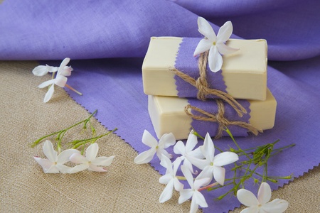 Jasmine soap. Jasmine blossoms in the backgroundの写真素材