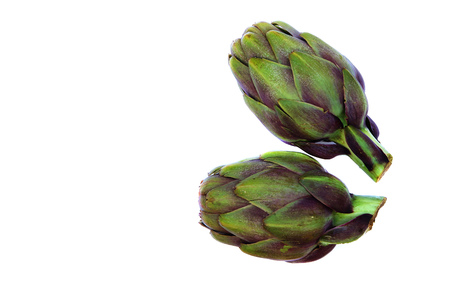 Two violet artichokes. Isolated over white. Copyspaceの写真素材