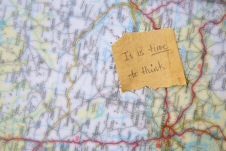 Message left on the road map: "It is time to think"の写真素材