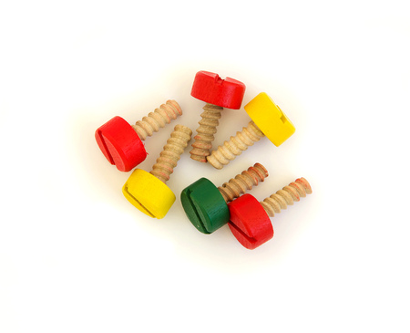 Wooden made screws. Isolated over whiteの写真素材