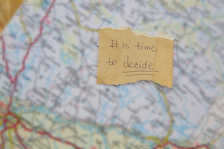 Message left on the road map: "It is time to decide"の写真素材