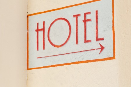 Indication for hotel at the wall of a building.の写真素材