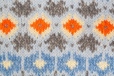 Colorful wool winter sweater. Closeup. Backgroundの写真素材