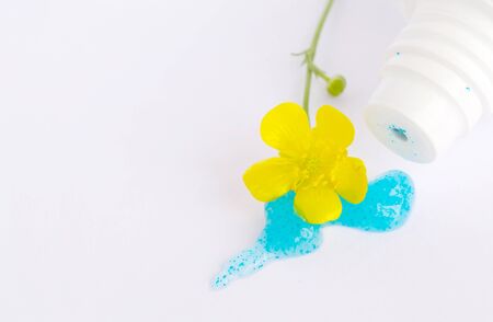 Face exfoliant gel scrub. Close up.White backgroundの写真素材