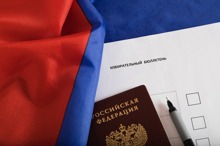 Sample of ballot paper and Russian pass with a pen on it. Translation - Russian Federation. And on the paper - ballot paper.の写真素材