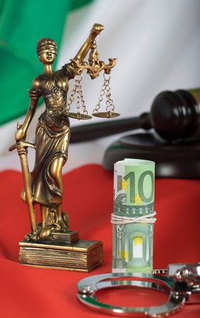 Euros close to the statue of Themis. Italian flag in the backgroundの写真素材