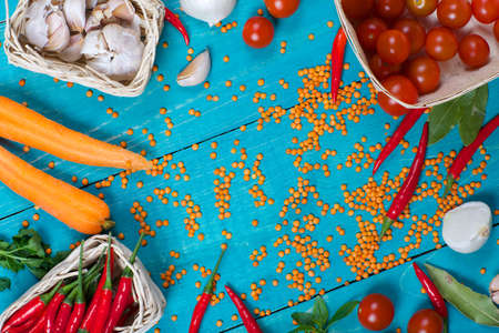Ingredients for preparing stewed lentils with vegetables. Flat layの写真素材