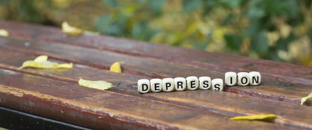 Word DEPRESSION composed of wooden letters. Closeupの写真素材