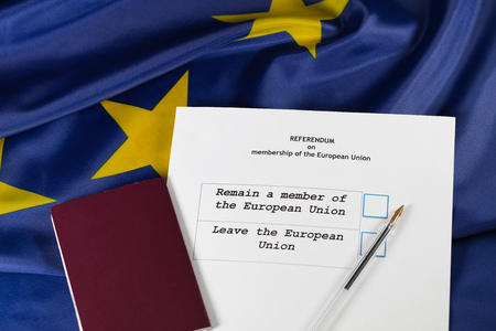 EU Referendum ballot paper, black pen, and passport on the table. Closeupの写真素材