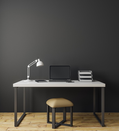 Modern interior with empty laptop on desk and copy space on concrete wall. Mock up, 3D Rendering の写真素材