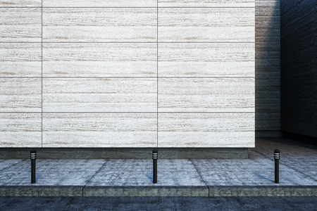 front view on large blank modern street concrete wall with lights on sidewalk. 3D renderの写真素材