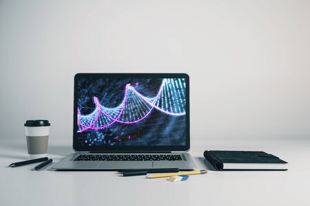Laptop closeup with dna drawing on computer screen. Education concept. 3d rendering.の写真素材