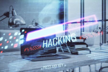 Hacking theme hologram with desktop office background. Double exposure.の写真素材