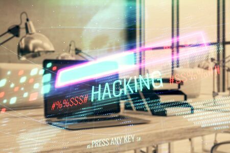 Hacking theme hologram with desktop office background. Double exposure.の写真素材