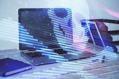Hacking theme hologram with desktop office background. Double exposure.の写真素材