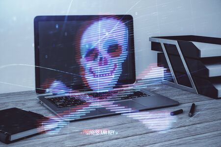 Hacking theme hologram with desktop office background. Double exposure.の写真素材