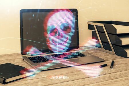Hacking theme hologram with desktop office background. Double exposure.の写真素材