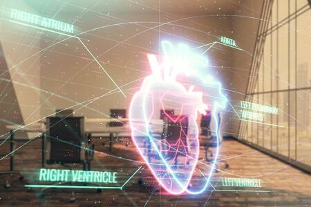 Double exposure of heart hologram on conference room background. Concept of medical educationの写真素材