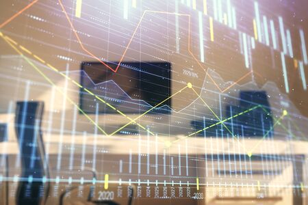 Stock market chart and desktop office computer background. Multi exposure. Concept of financial analysis.の写真素材