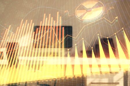 Stock market chart and desktop office computer background. Multi exposure. Concept of financial analysis.の写真素材