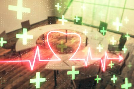 Double exposure of heart hologram on conference room background. Concept of medical educationの写真素材